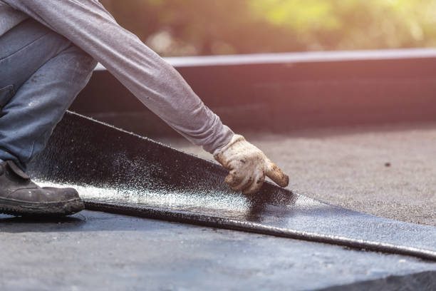 Professional Basement Waterproofing technician working in Rose Hill, KS